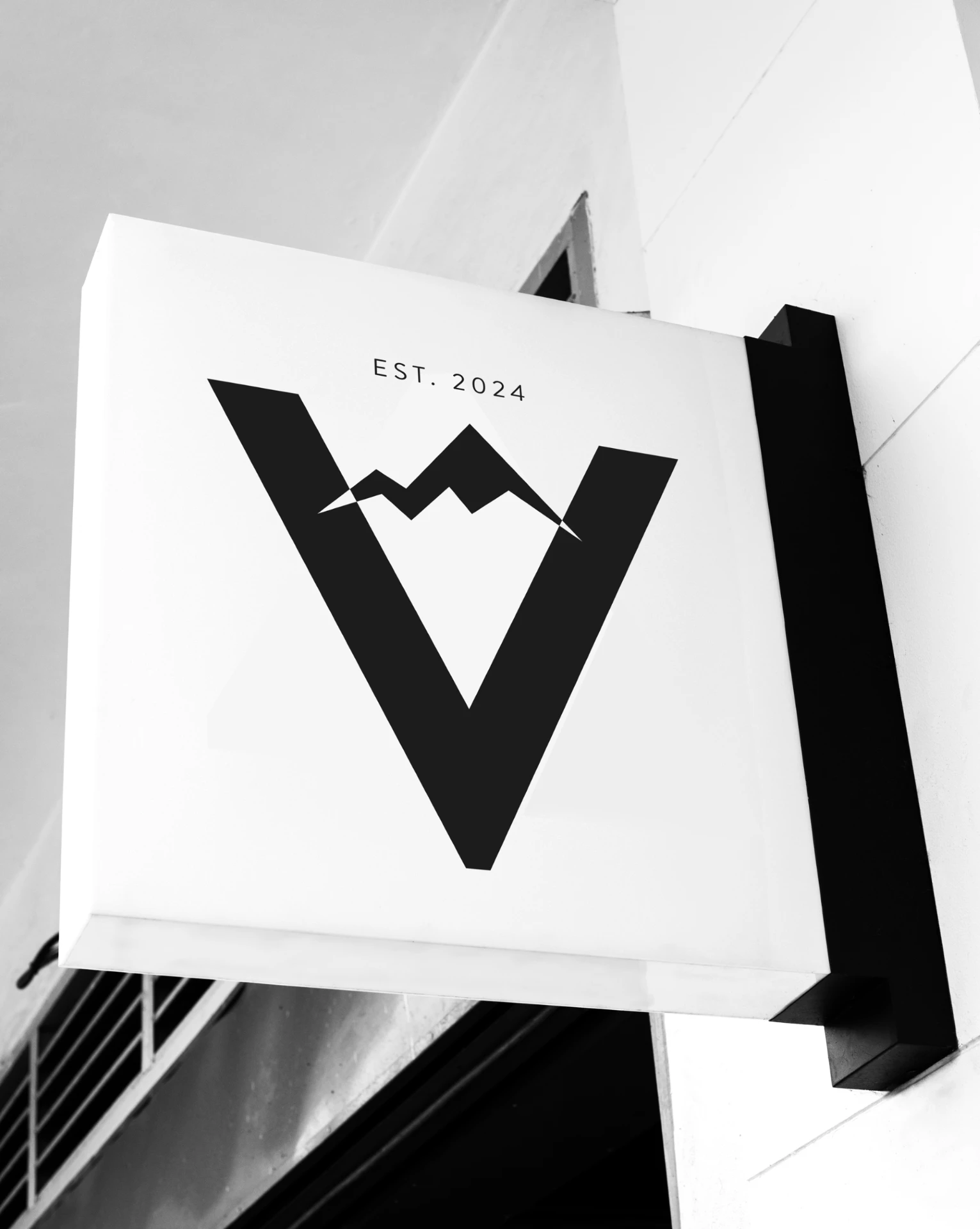 Valley Studio exterior sign with the mountain V logo, est. 2024
